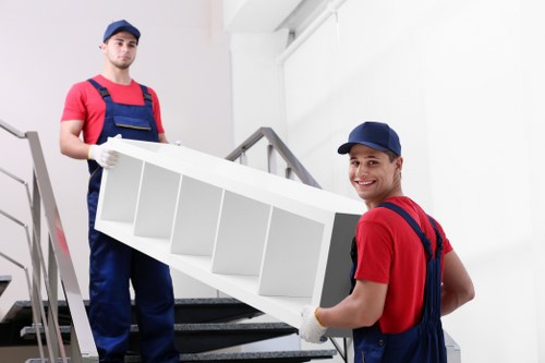 Moving boxes and furniture during Bayswater removals