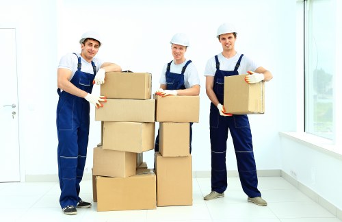 Professional removals team demonstrating insurance and safety standards