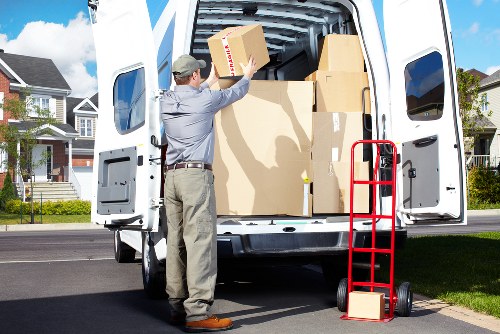 Professional movers preparing a Bayswater removal van