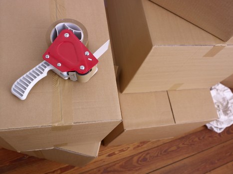 Movers safely loading belongings into a removal van in Bayswater